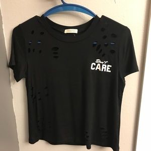 Black “Don’t Care” ripped top
